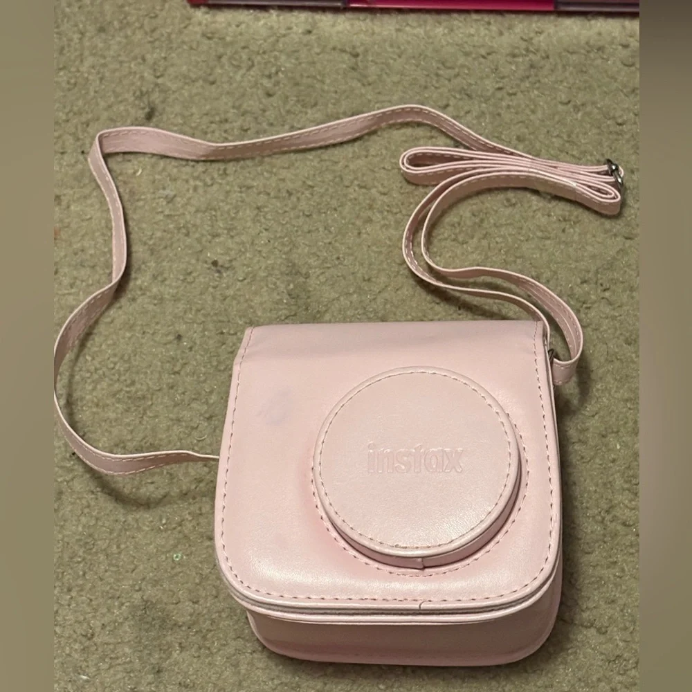NWOT instax mini 7+ pink camera case with a long strap